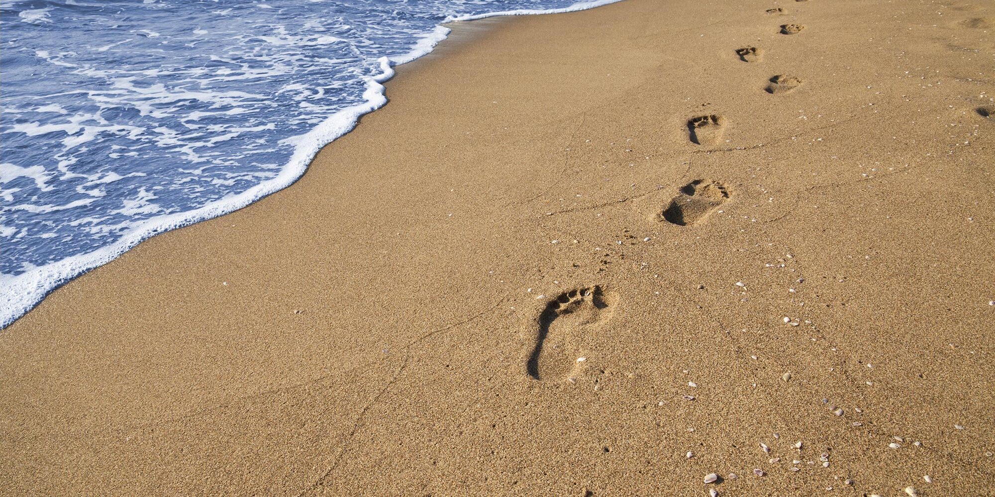 footprints on the beach